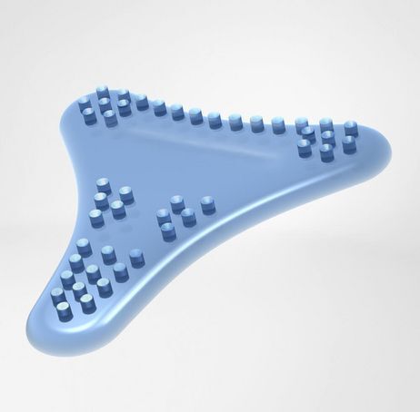 Blaues, tropfenförmiges Element mit Noppen. Oberflächenstruktur mit kleinen, runden Erhebungen.