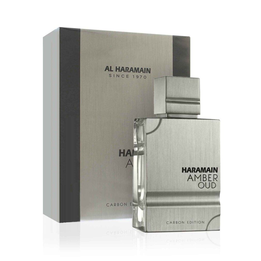 Parfümflakon und Verpackung. Silberfarbenes Design mit Schriftzug HARAMAIN AMBER OUD CARBON EDITION. Rechteckige Form.