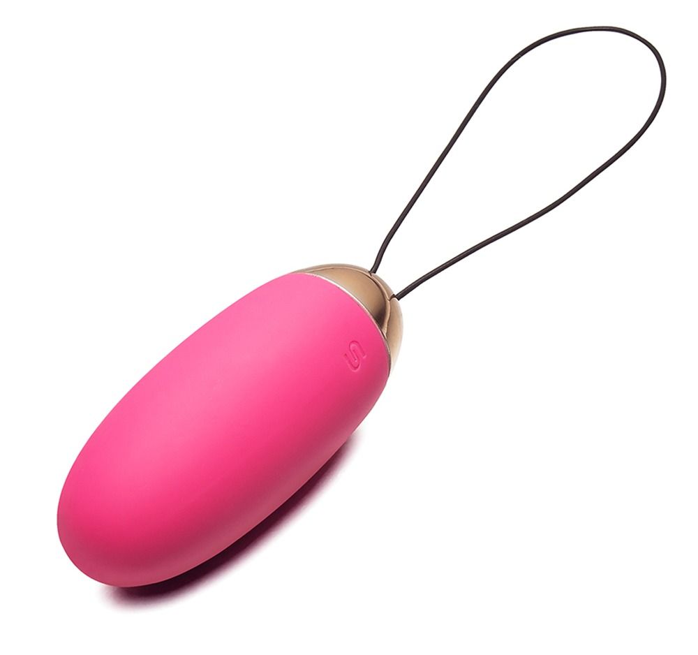 Rosa Vibrator mit goldfarbener Spitze und schwarzer Schlaufe. Auf weißem Hintergrund.