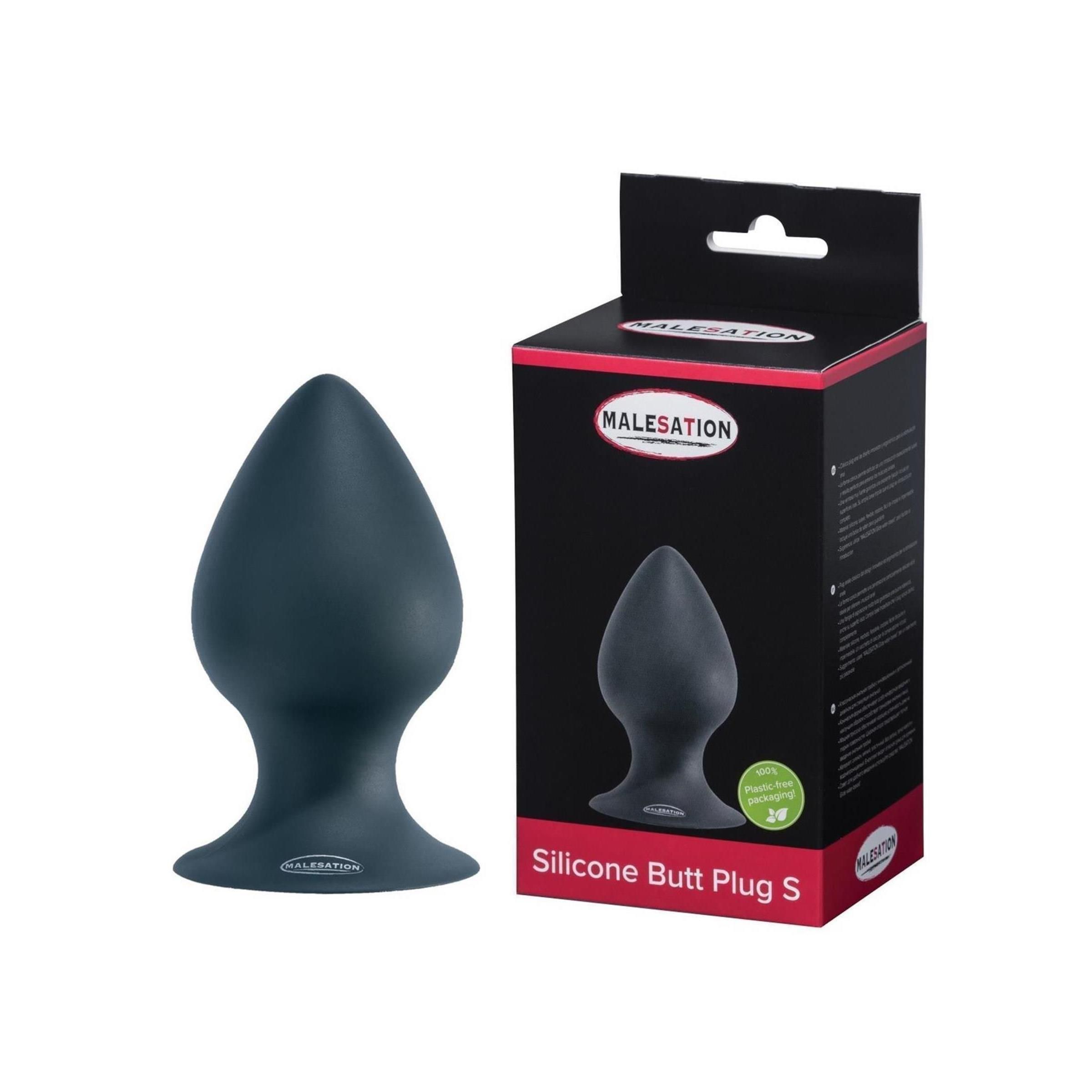 Dunkelgrauer Silikon-Analplug mit breiter Basis und spitz zulaufender Form. Verpackung mit Produktabbildung und Größenangabe 'S'.