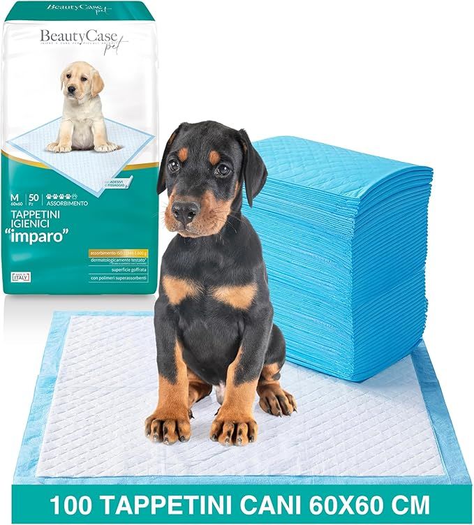 Hygienische Hundepads, blaue Farbe, mit einem Welpen und einem Dobermann-Welpen. Verpackung mit Produktnamen und Größe.