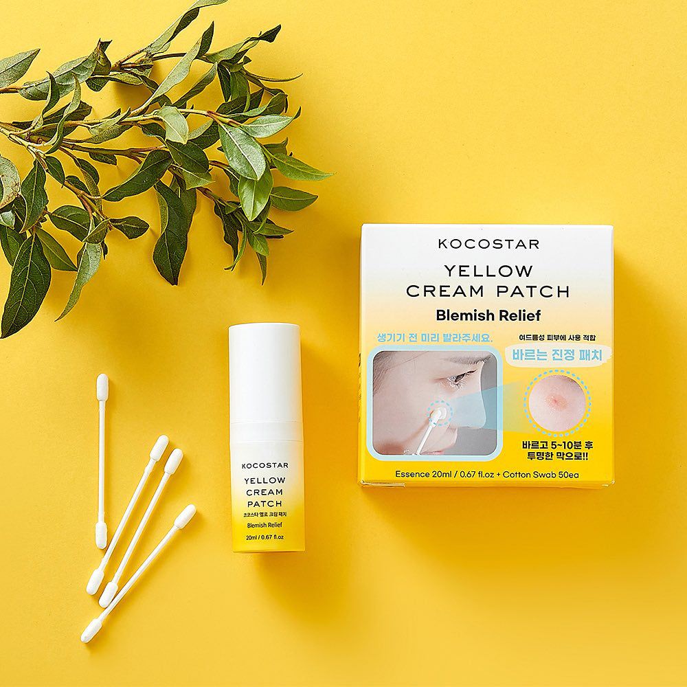 KOCOSTAR Yellow Cream Patch, Schachtel und Tube, daneben Wattestäbchen. Aufschrift: Blemish Relief. Gelber Hintergrund.