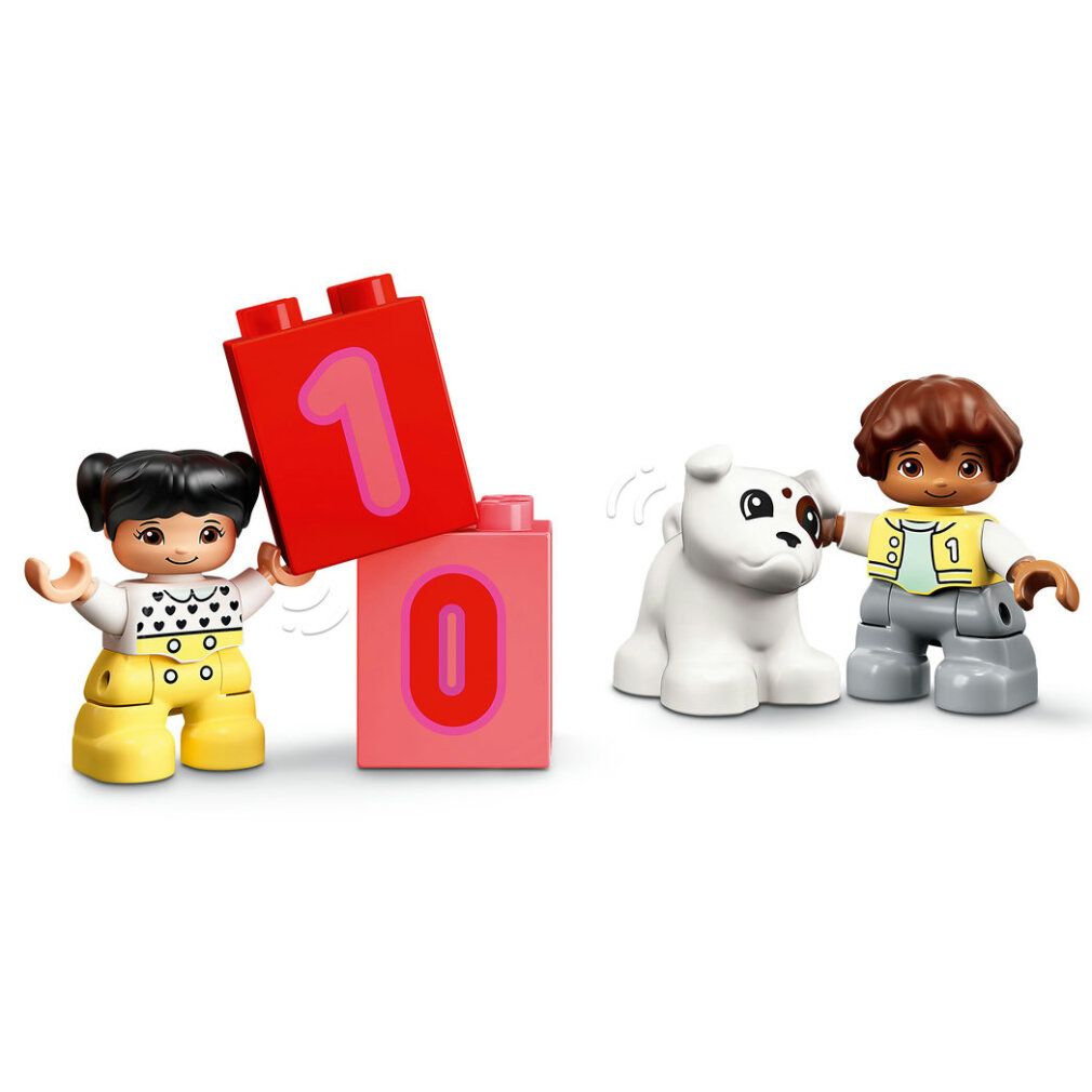 LEGO DUPLO Zahlenzug. Figuren halten Bausteine mit Zahlen 0 und 1. Weißer Hund. Produktabbildung.