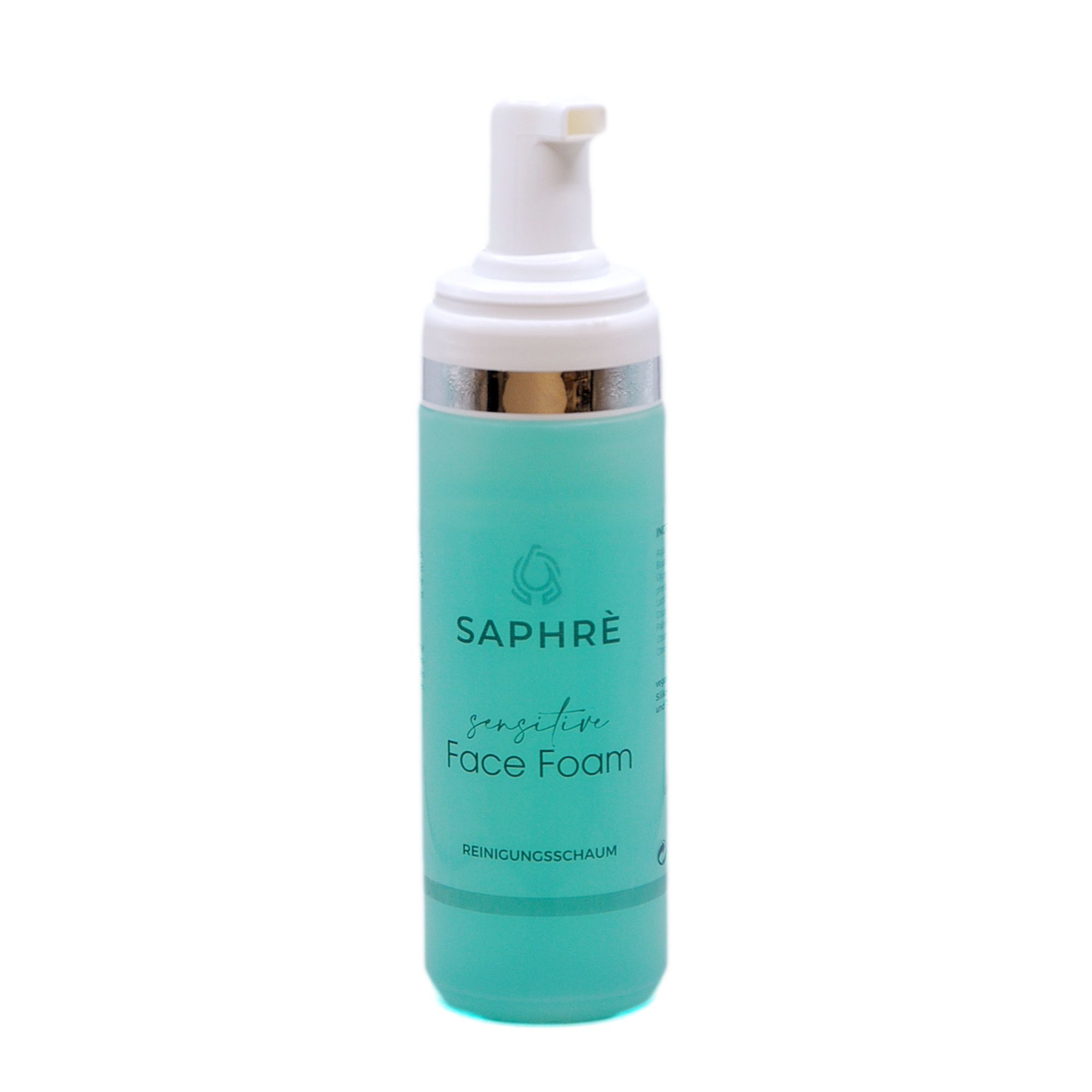 Türkisgrüne Flasche mit weißem Pumpkopf. Aufschrift: Saphre Sensitive Face Foam. Silberner Ring.