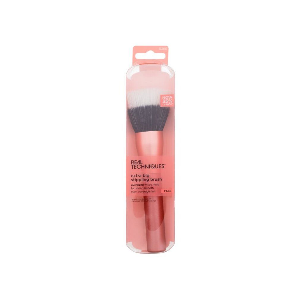 Pinsel in transparenter Verpackung. Rosa Griff, schwarze und weiße Borsten. Text: Real Techniques, extra big Stippling Brush.