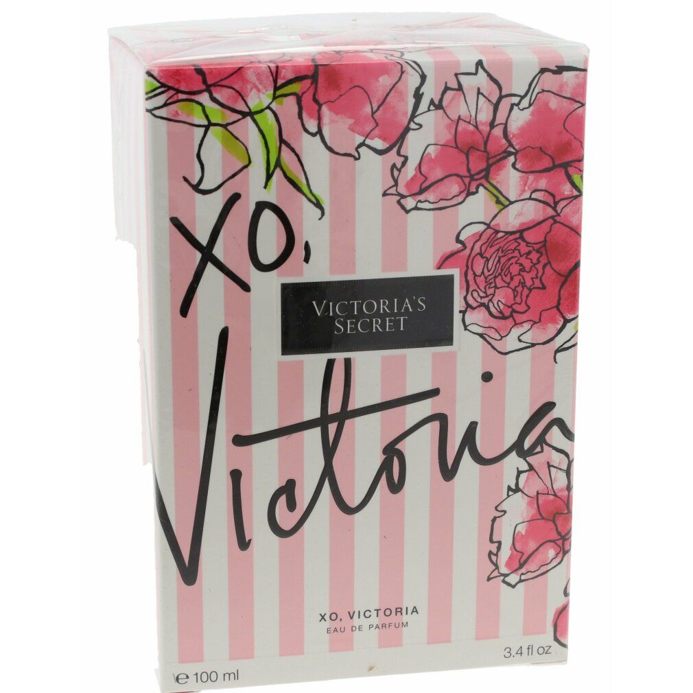 Verpackung mit floralem Muster und Schriftzug. Rosa Streifen und Blüten. Text: XO, Victoria, Victoria's Secret.