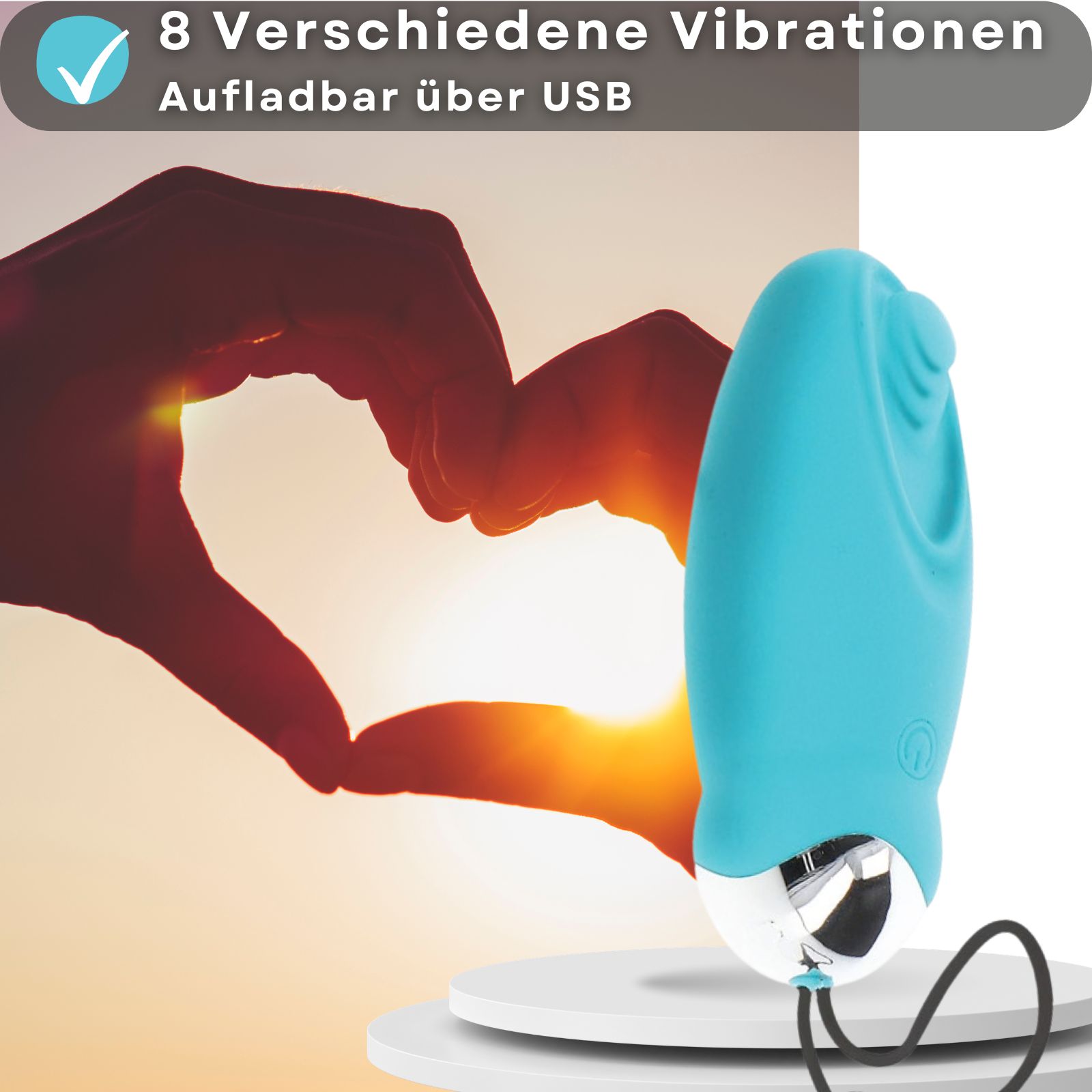 Blaues Vibrations-Ei. Länge 9 cm, Durchmesser 3,3 cm. Mit weißem Sockel und schwarzem Kabel.