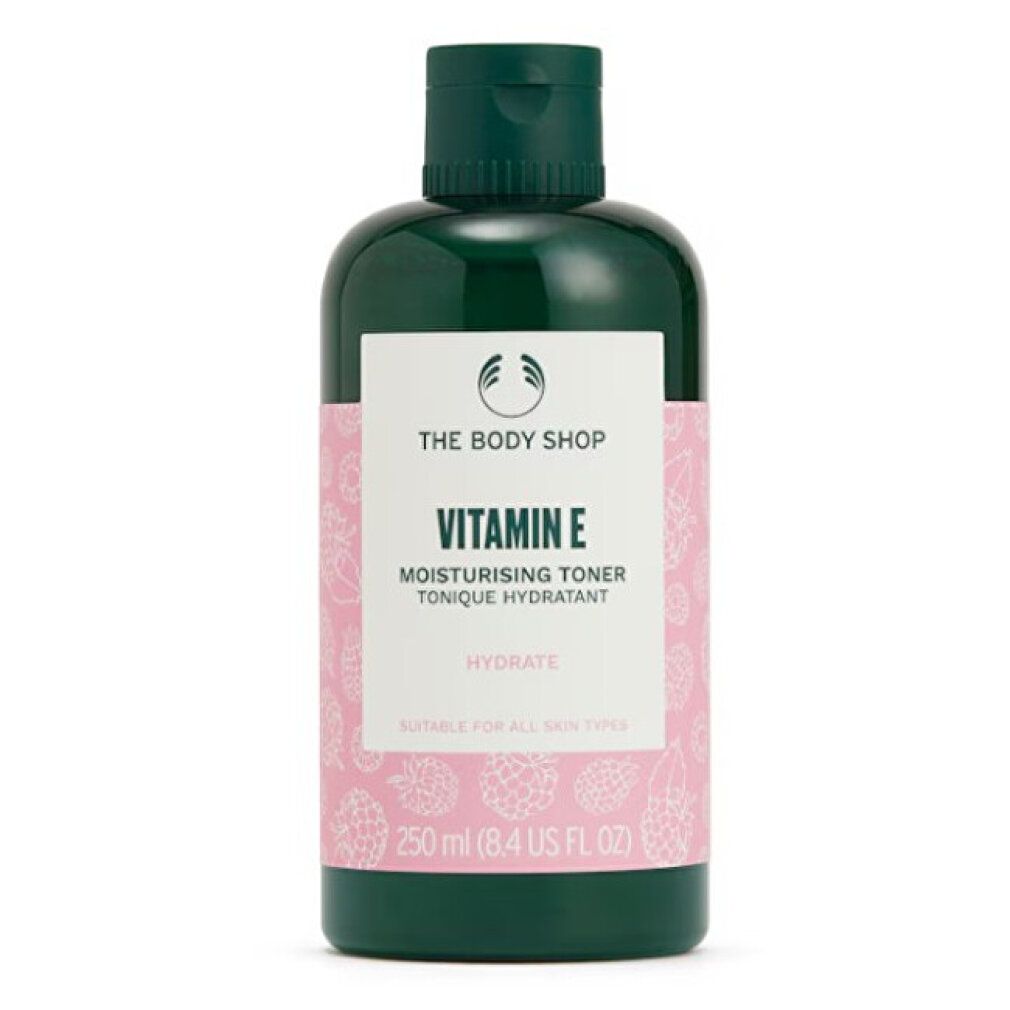 Grüne Flasche mit rosa Etikett. Aufschrift: Vitamin E, Moisturising Toner, Hydrate. Marke: The Body Shop. Geeignet für alle Hauttypen.