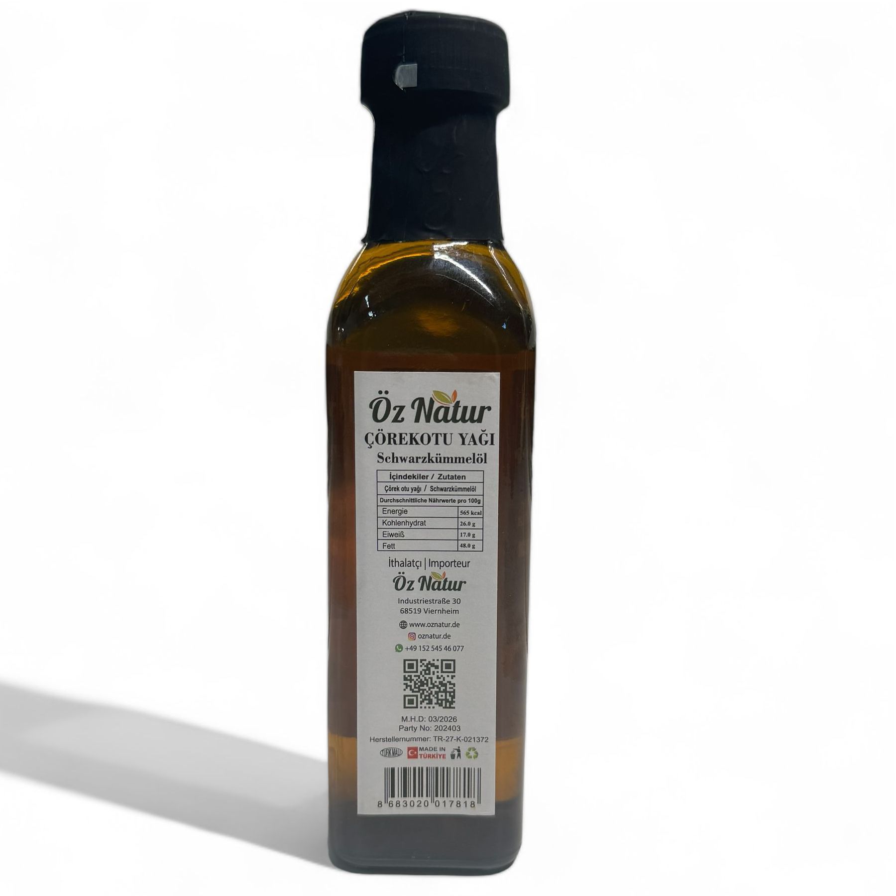 Rückseite der Öz Natur Schwarzkümmelöl-Flasche, Etikett mit Nährwertangaben und Logo.