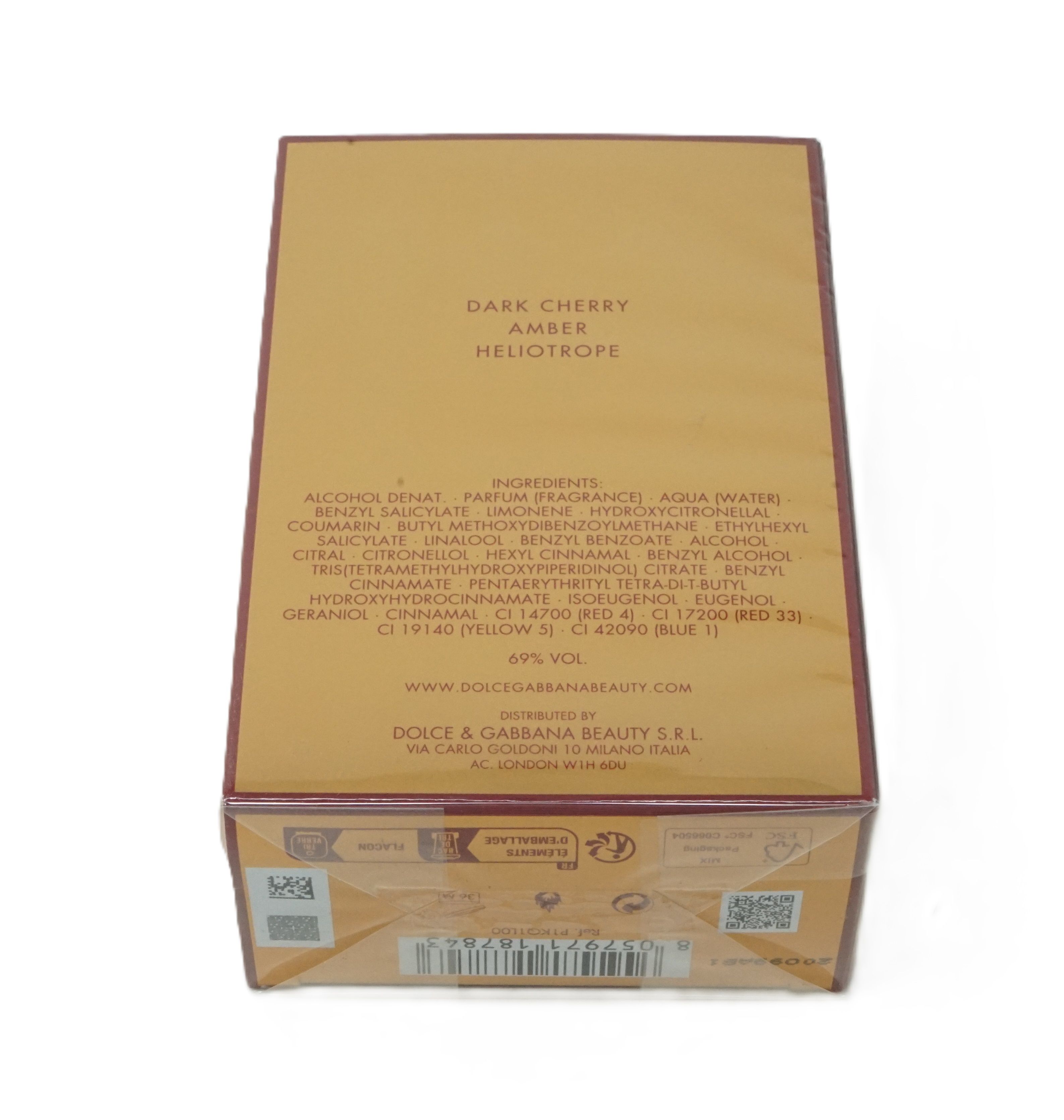 Parfümverpackung, braun-goldfarben. Aufschrift: Dark Cherry, Amber, Heliotrope. Zutatenliste und Dolce & Gabbana Beauty S.r.l. Informationen.
