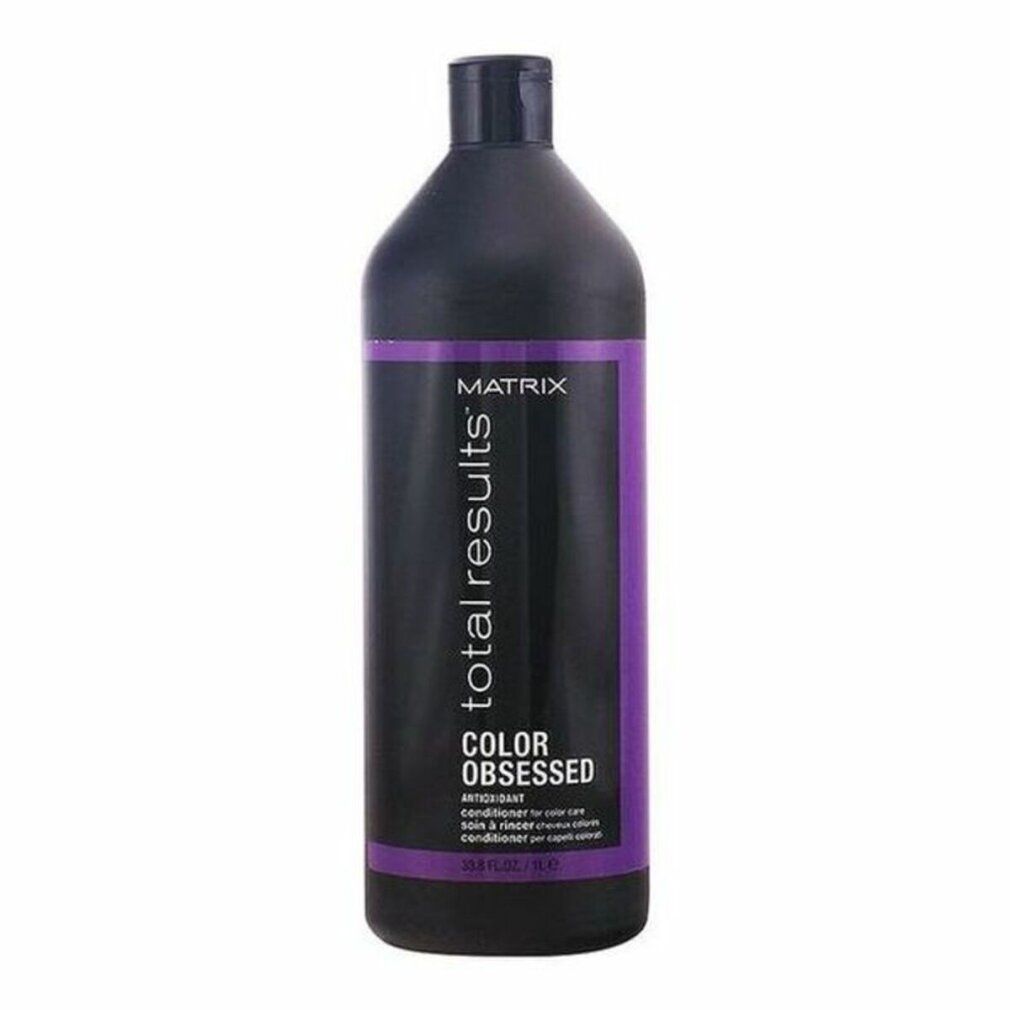 Schwarze Flasche mit lila Etikett. Aufschrift: Matrix Total Results Color Obsessed Conditioner. 1 Liter.