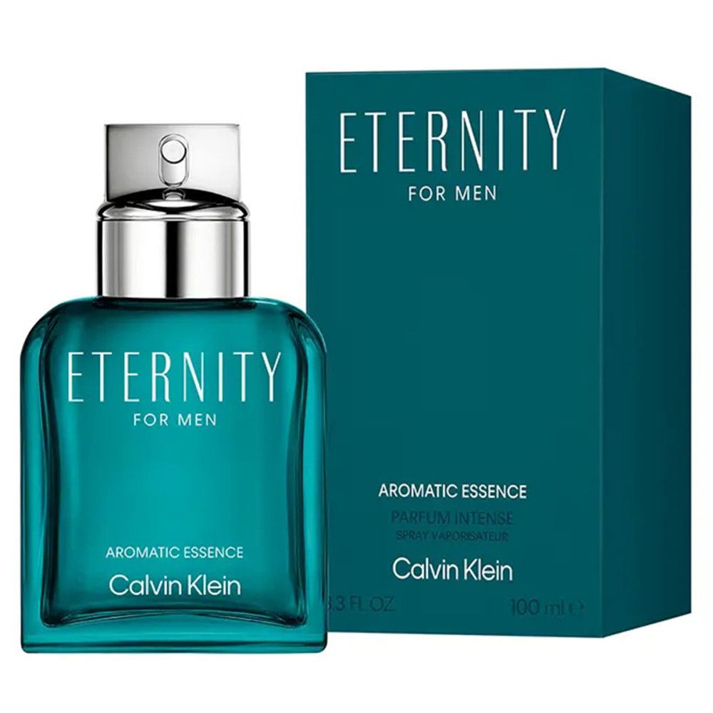 Türkisgrüner Flakon und Schachtel. Aufschrift: Eternity for Men, Aromatic Essence, Calvin Klein. Flakon mit silbernem Verschluss.