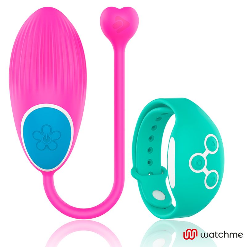 Pinkes Vibro-Ei mit Herzspitze und türkisfarbenem Armband mit Symbolen.