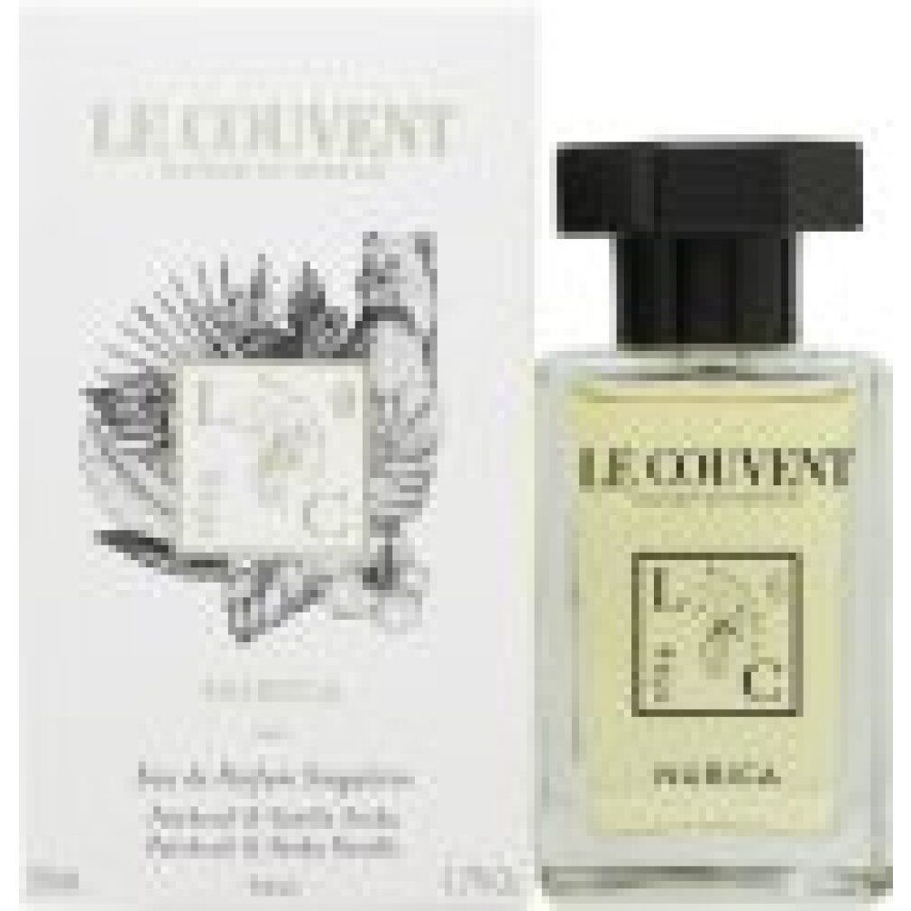 Parfümflasche und Verpackung. Flasche mit schwarzem Deckel, rechteckig. Verpackung mit Logo und Produktnamen.