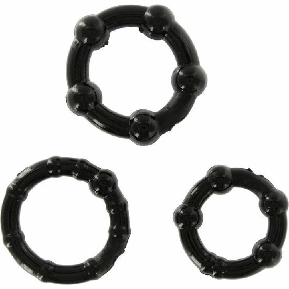 Drei schwarze Penisringe. Oben ein Ring mit Kugeln, darunter zwei Ringe mit Noppen. Alle Ringe sind rund.