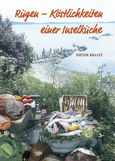 Buchcover: Titel „Rügen - Köstlichkeiten einer Inselküche“. Autor Dieter Kraatz. Essen auf Tisch: Brot, Fisch, Obst, Gemüse.