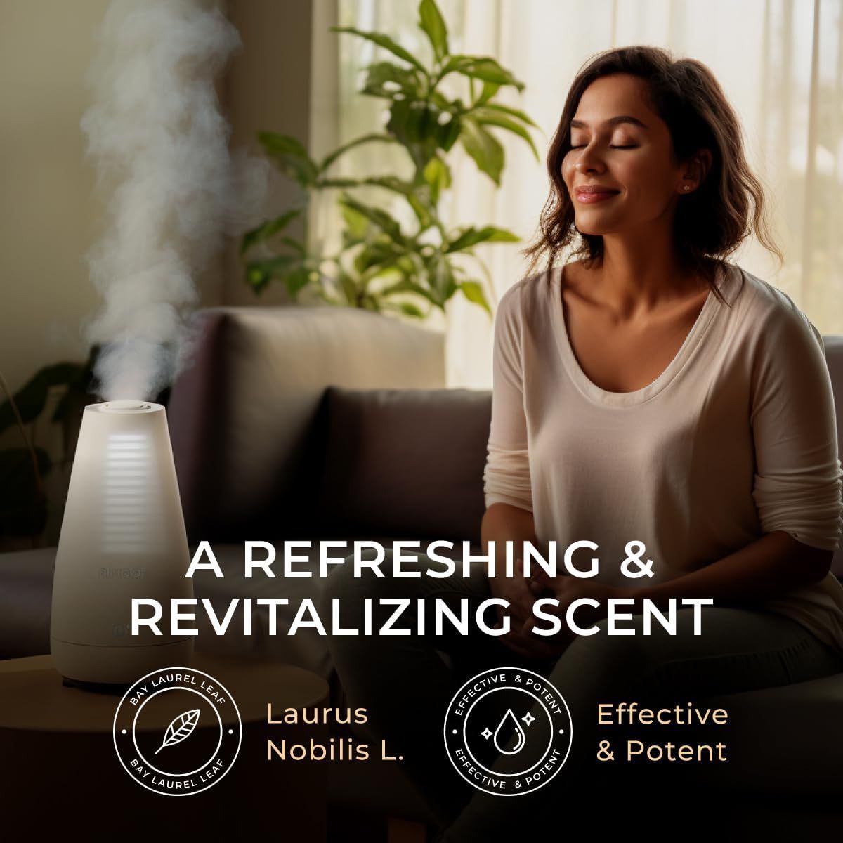 Weißer Diffusor, Dampf, Frau auf Sofa. Text: A Refreshing & Revitalizing Scent, Bay Laurel Leaf, Effective & Potent.