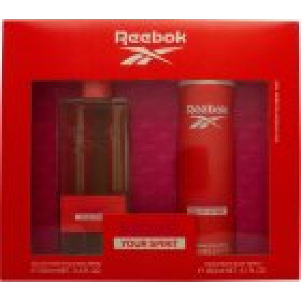 Rotes Geschenkset mit Reebok-Logo. Enthält Flakon, zylindrische Dose und rechteckige Box mit Aufschrift "YOUR SPIRIT".