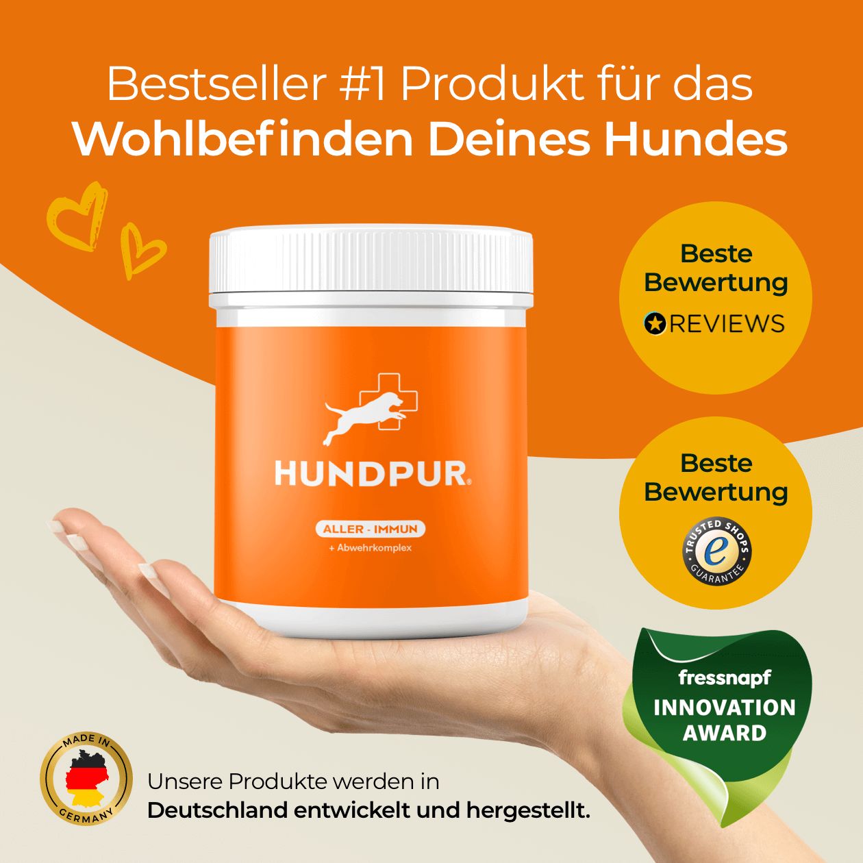 Hand hält Produktglas mit orangefarbenem Etikett. Text: Bestseller #1. Beste Bewertung. Trusted Shops. Made in Germany. Fressnapf Innovation Award.