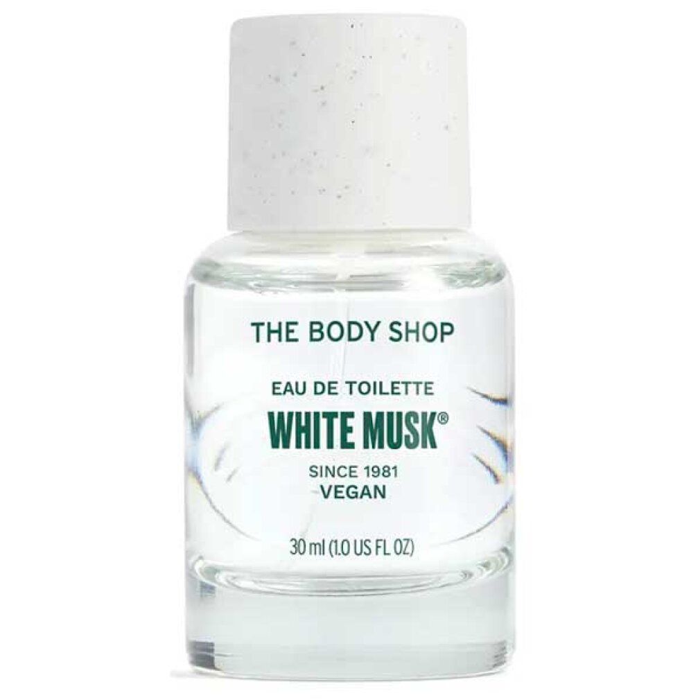 Klarer Glasflakon mit weißem Deckel. Aufschrift: "THE BODY SHOP", "WHITE MUSK", "EAU DE TOILETTE", "VEGAN".