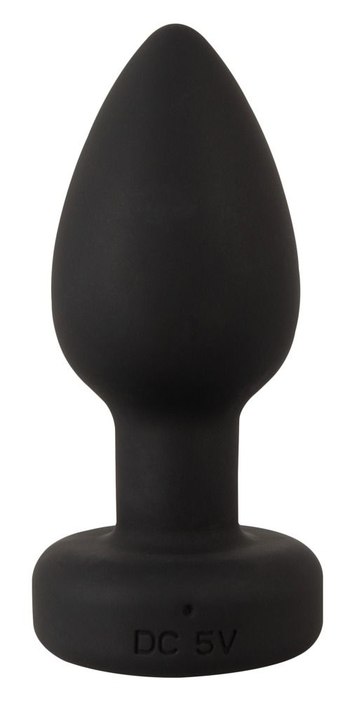 Schwarzer Analplug. Kegelförmiger Schaft mit rundem Ende. Aufschrift DC 5V auf dem Boden.