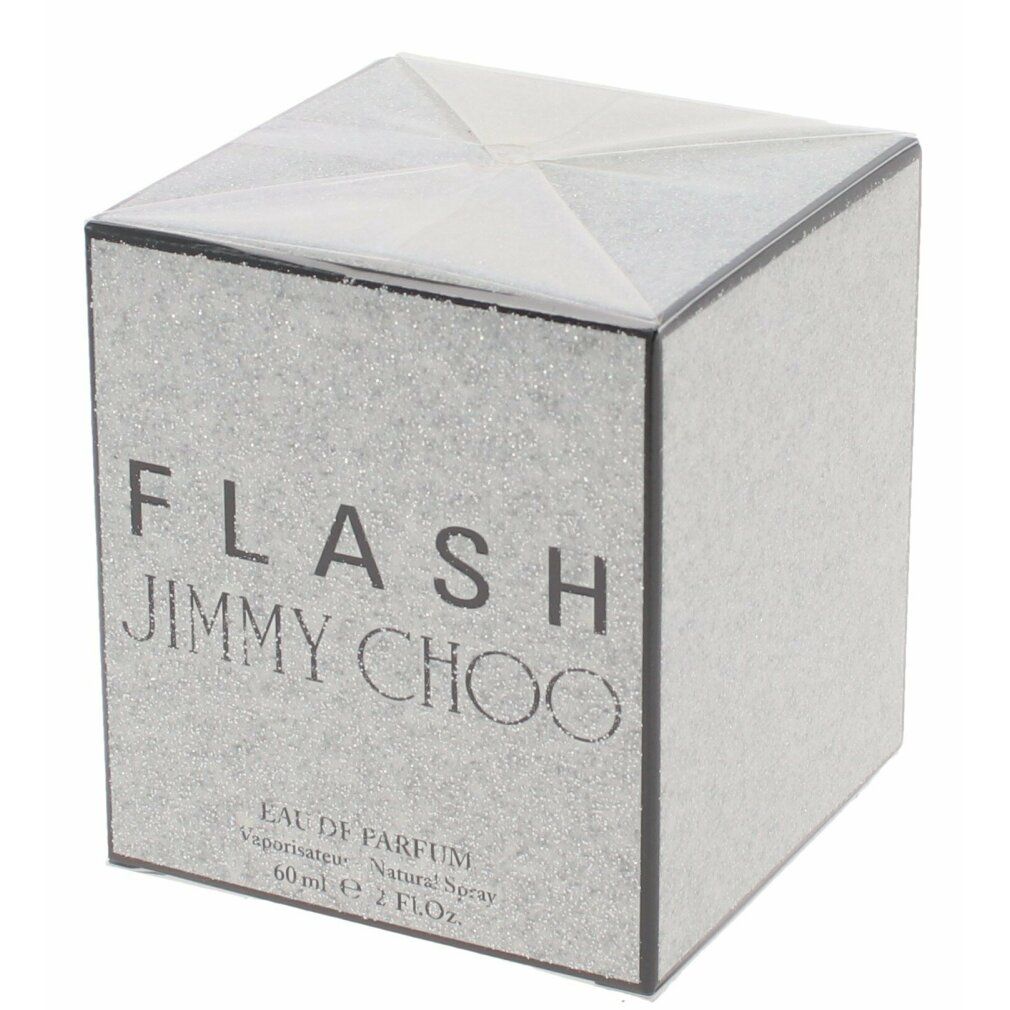 Quadratische Schachtel mit glitzernder Oberfläche. Aufschrift: FLASH JIMMY CHOO. Text: Eau de Parfum, Natural Spray, 60 ml, 2 FL.OZ.