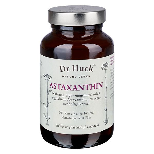 Braune Glasflasche mit silbernem Deckel. Etikett mit Produktnamen und Informationen. Aufschrift: Dr. Huck Astaxanthin Kapseln Vegan.