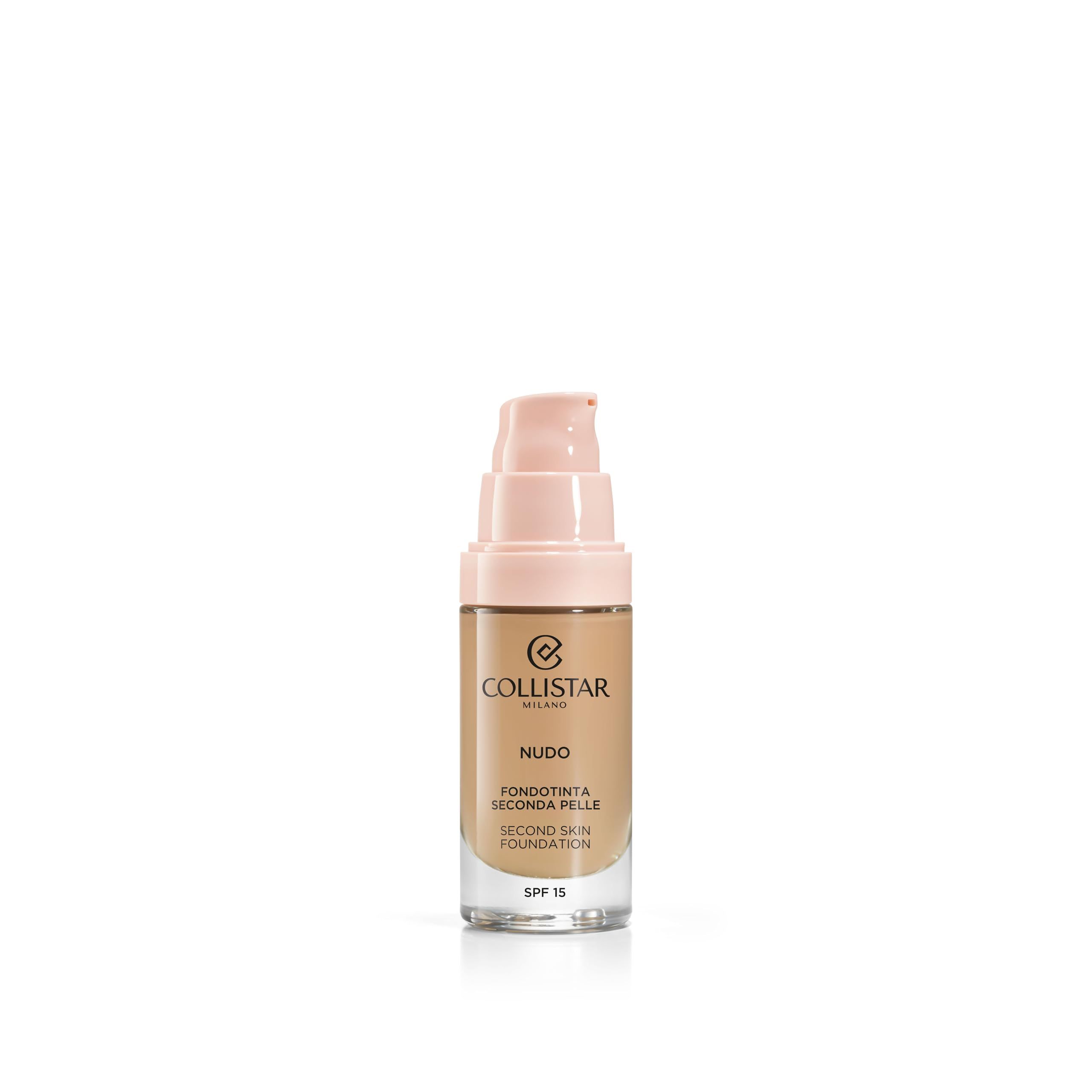 Beige Flasche mit rosa Pumpkopf. Aufschrift: Nudo, Second Skin Foundation, SPF 15.