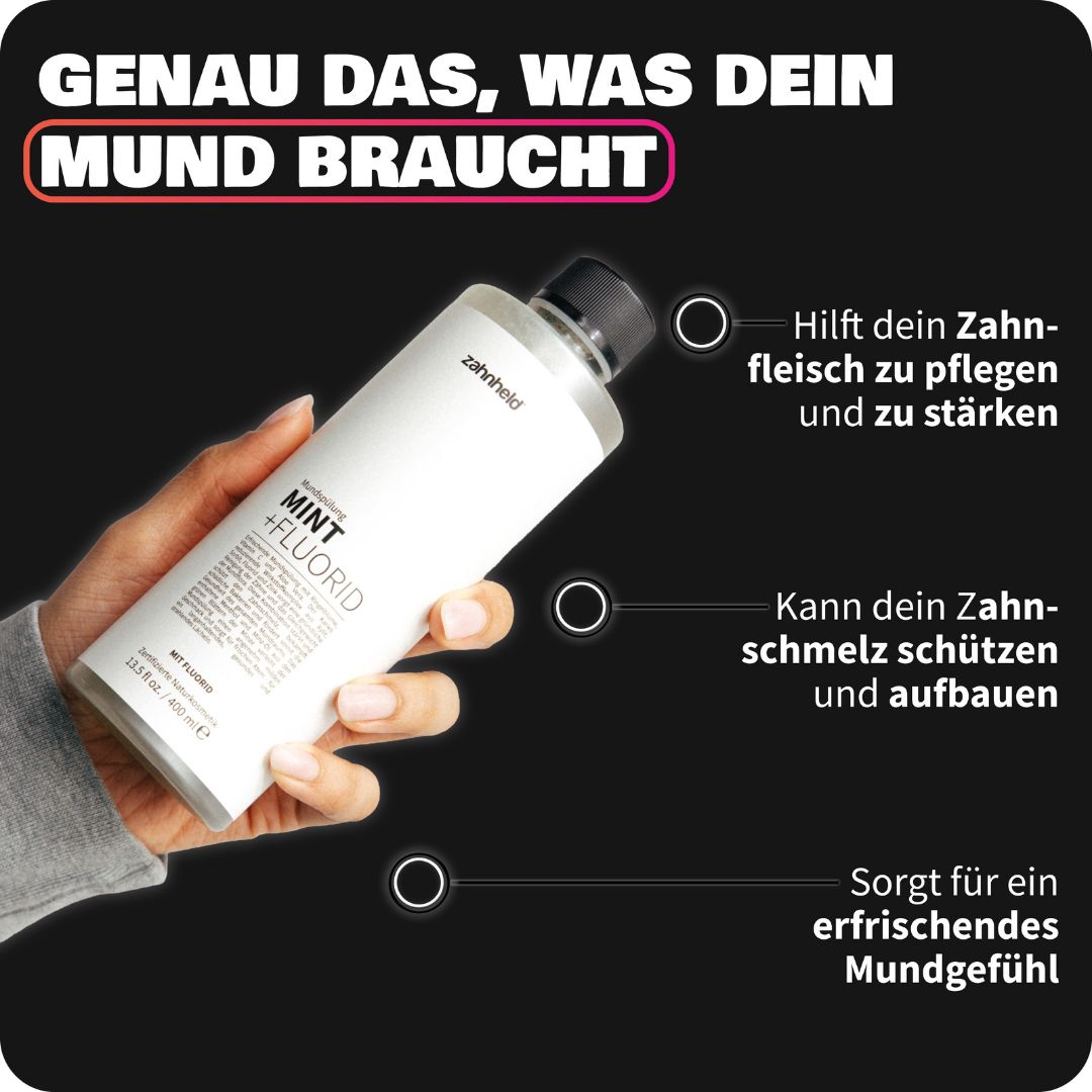 Hand hält Zahnheld Mundspülung Mint Flasche, Vorteile werden hervorgehoben.
