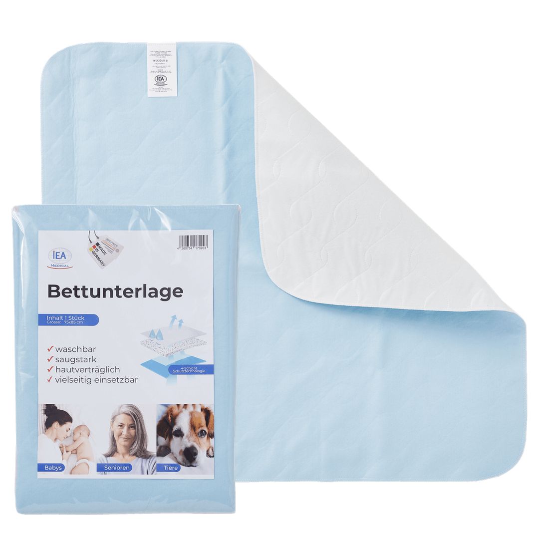 Inkontinenzunterlage mit Verpackung. Blaue Unterlage, weißer Rand. Verpackung: IEA, Bettunterlage, Text.