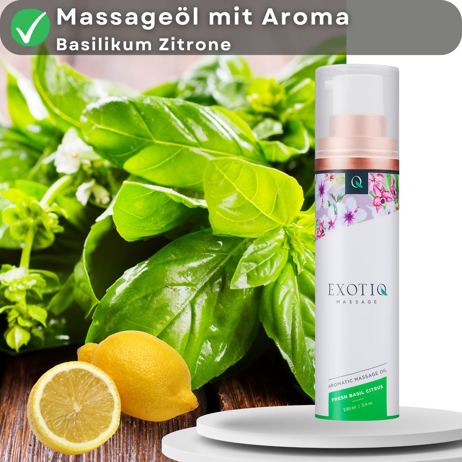 Massageöl-Flasche neben Basilikum und Zitrone. Grünes Häkchen über dem Produkt. Text: Massageöl mit Aroma Basilikum Zitrone.