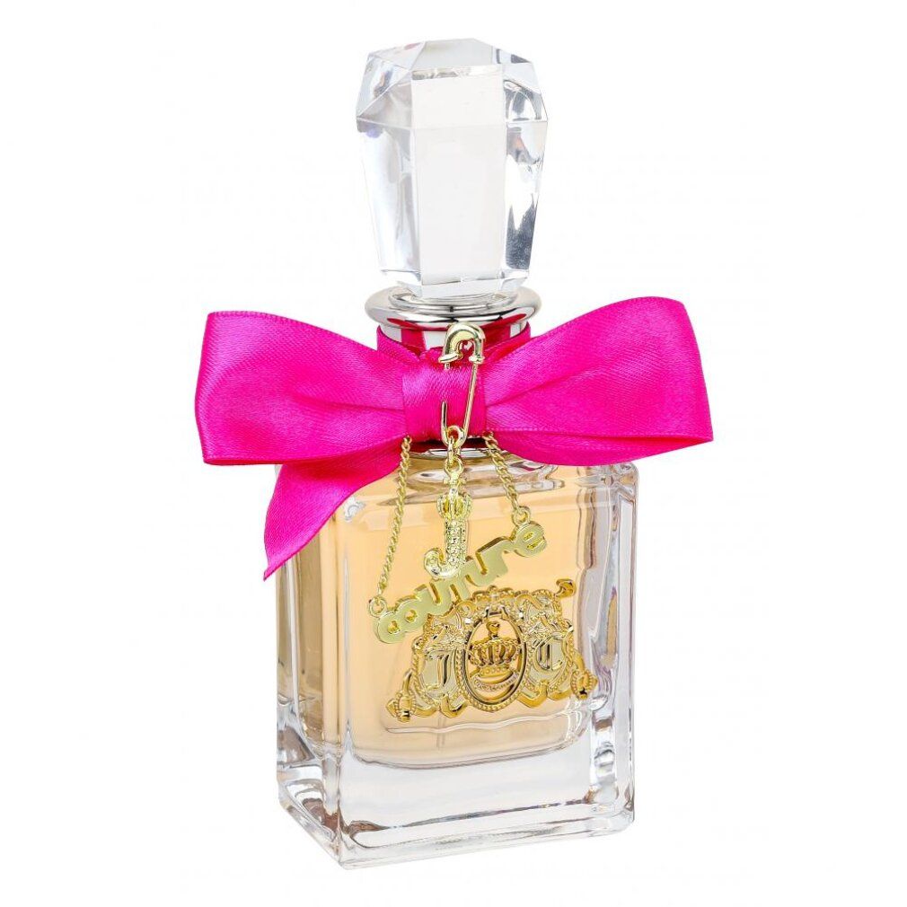 Parfümflasche mit rosa Schleife und Anhänger. Rechteckige Glasflasche mit goldfarbenem Emblem.