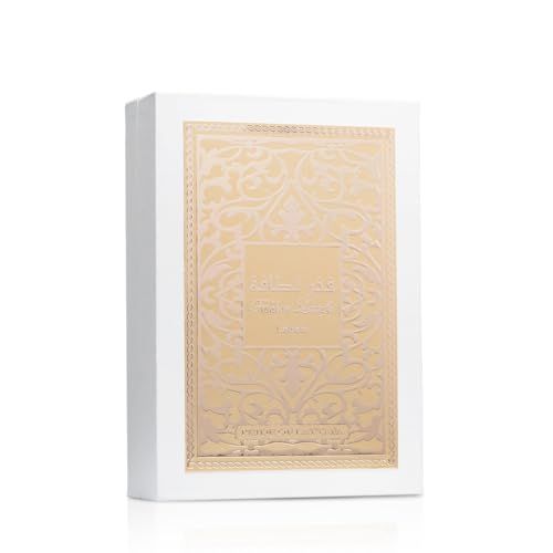 Weiße Schachtel mit goldenem Muster und arabischen Schriftzeichen. Eckige Form.
