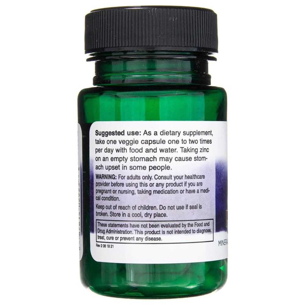 Seite einer Flasche Zinkorotat-Kapseln mit Anwendungshinweisen und Warnungen.