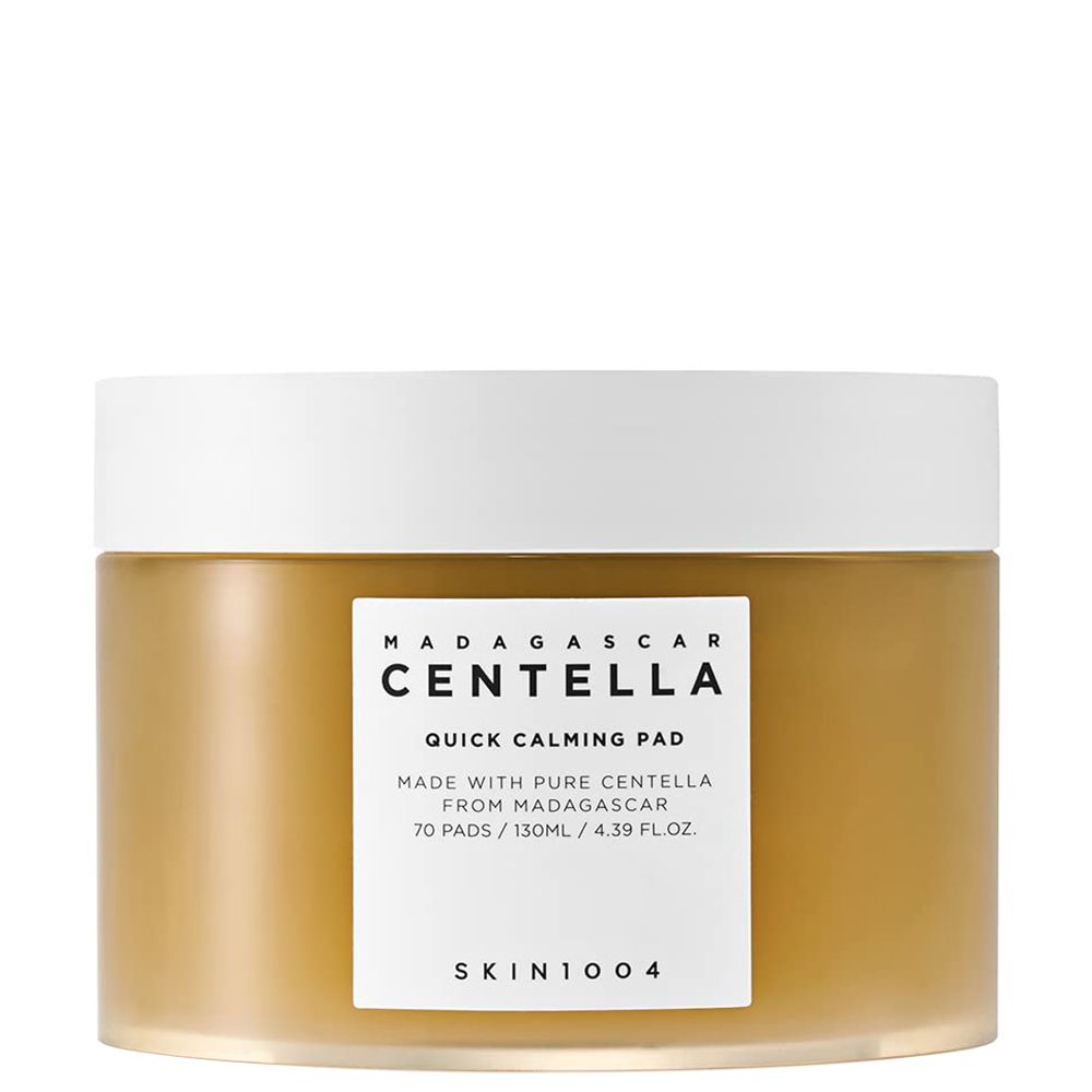 Ein bernsteinfarbener Tiegel mit SKIN1004 Madagascar Centella Quick Calming Pad und weißem Deckel.