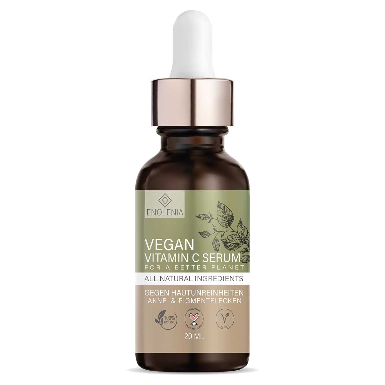 Braune Glasflasche mit Pipette. Etikett mit "ENOLENIA", "VEGAN VITAMIN C SERUM", Inhaltsstoffen und Logos. 20 ml.