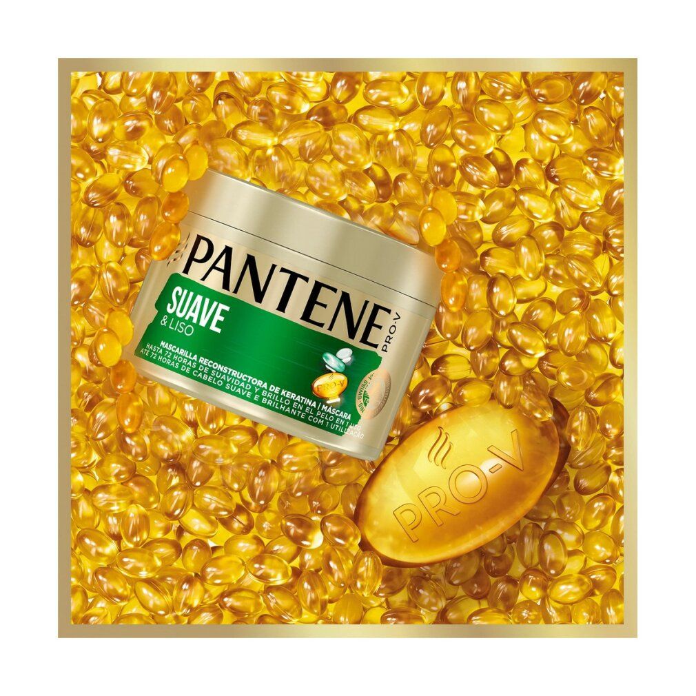 Goldfarbener Tiegel und Kapsel auf gelbem Hintergrund. Aufschrift: Pantene, Suave & Liso, Mascarilla Reconstructora. Pro-V Logo.