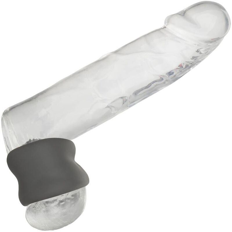 Hodensackring aus grauem Silikon, an einem transparenten Penis-Stimulator befestigt.