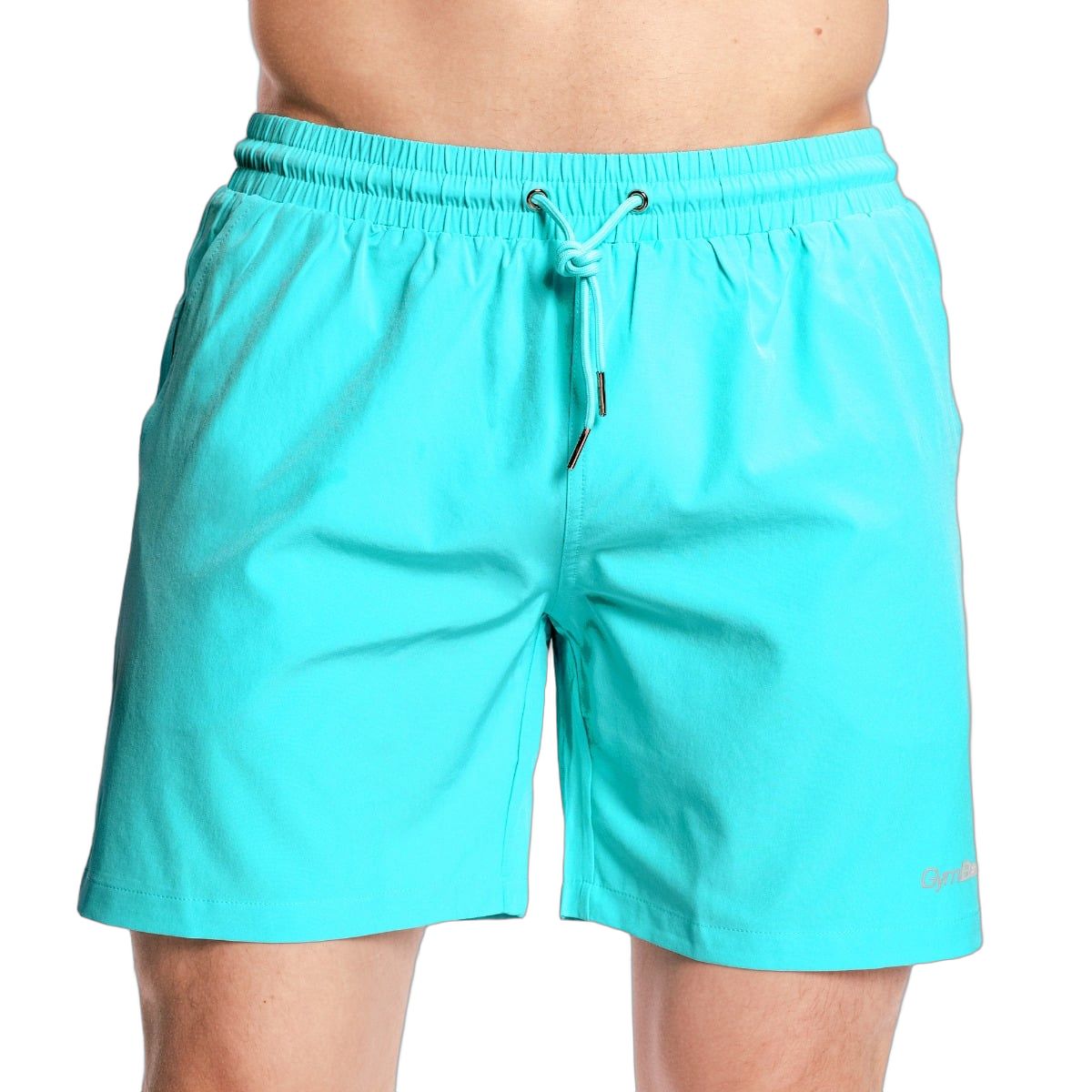 Türkisfarbene Badeshorts für Herren mit Kordelzug und seitlichen Taschen. Dezentes Logo auf dem Bein.