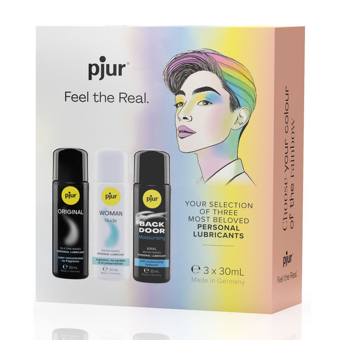 Verpackung mit drei Gleitmitteln. Aufdruck: pjur, Feel the Real. Abbildung einer Person mit Regenbogen-Haar. Text: Your selection of three most beloved personal lubricants.