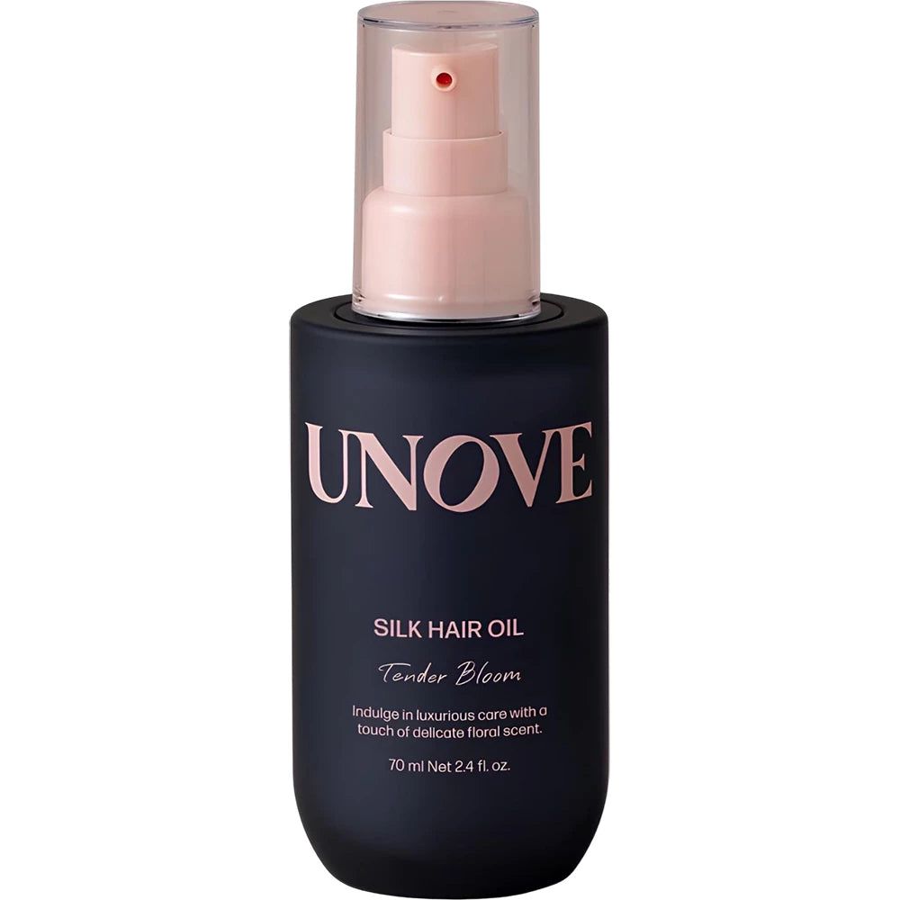 Dunkelblaue Flasche UNOVE Silk Hair Oil Tender Bloom mit Pumpspender und durchsichtiger Kappe.