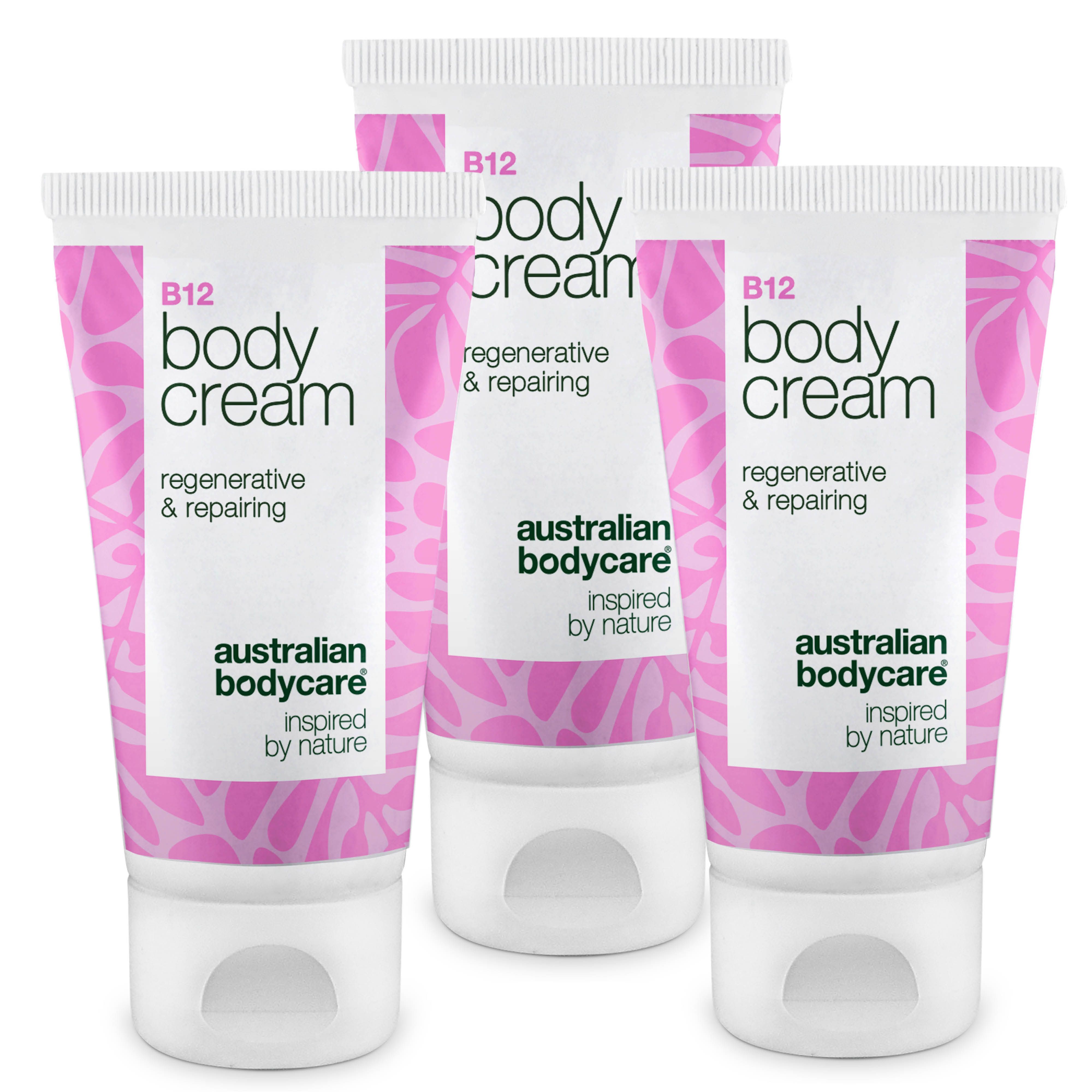 Drei Tuben Körpercreme mit B12. Rosa und weiße Verpackung. Text: Body Cream, regenerative & repairing, Australian Bodycare.