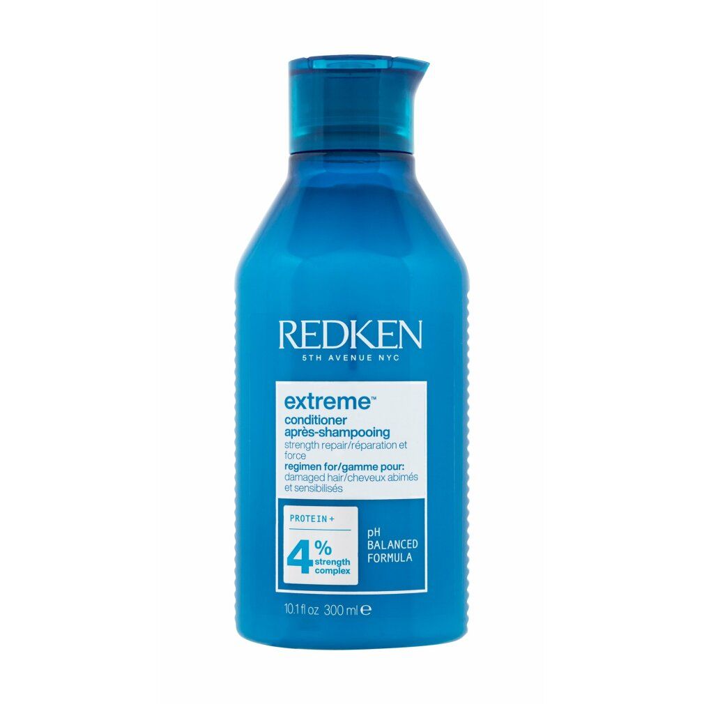 Blaue Flasche Redken Extreme Conditioner. Enthält 300 ml. Aufschrift: Extreme, pH Balanced Formula, 4% Strength Complex.