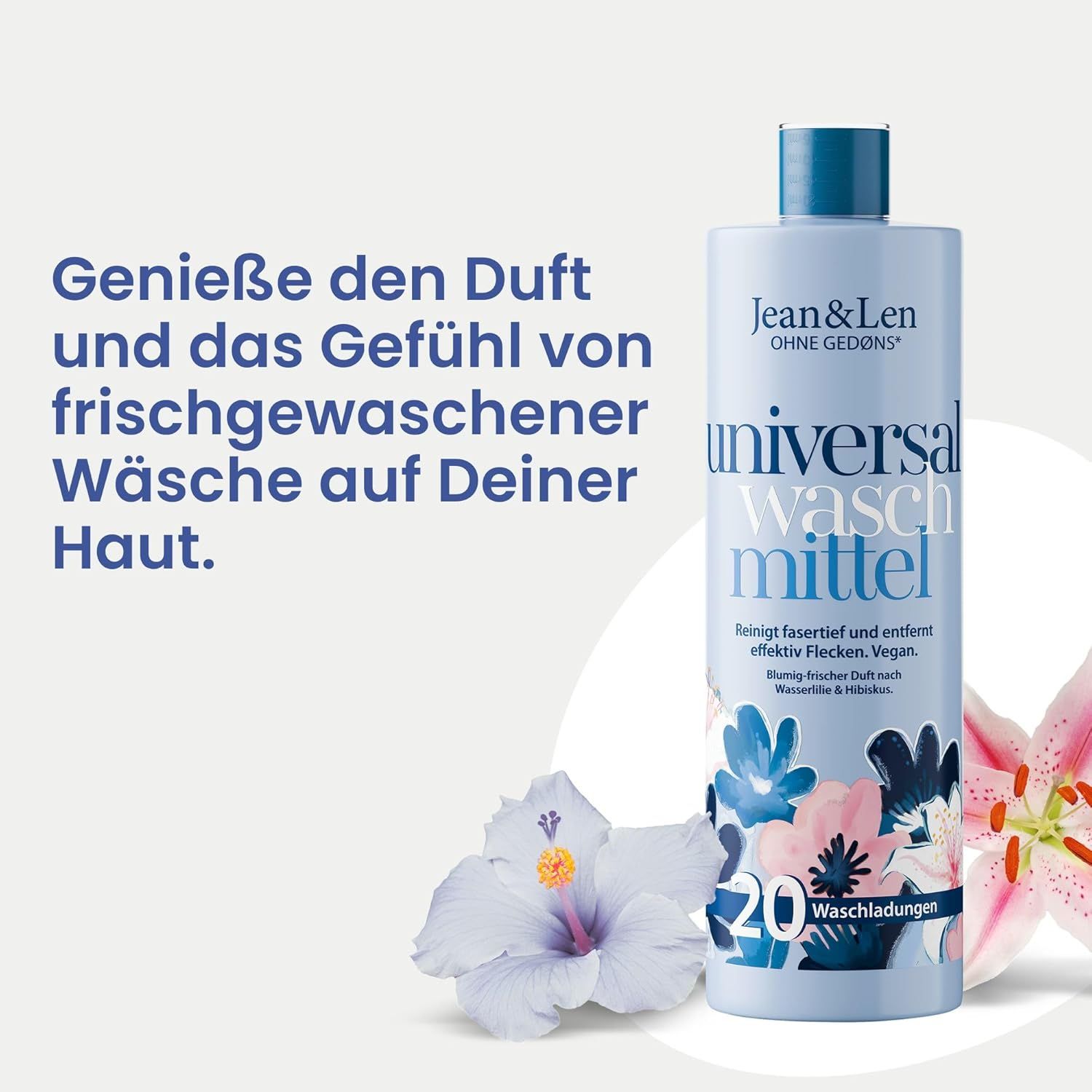 Hellblaue Flasche mit floralem Design. Text: Jean & Len Universalwaschmittel, 20 Waschladungen. Hibiskus- und Lilienblüten.