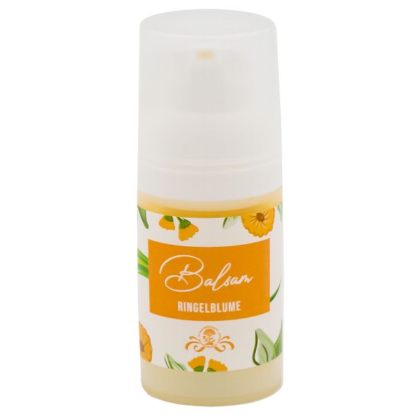 Balsam Ringelblume in einer weißen Flasche mit Spender. Orangefarbenes Etikett mit Produktnamen und floralen Illustrationen.