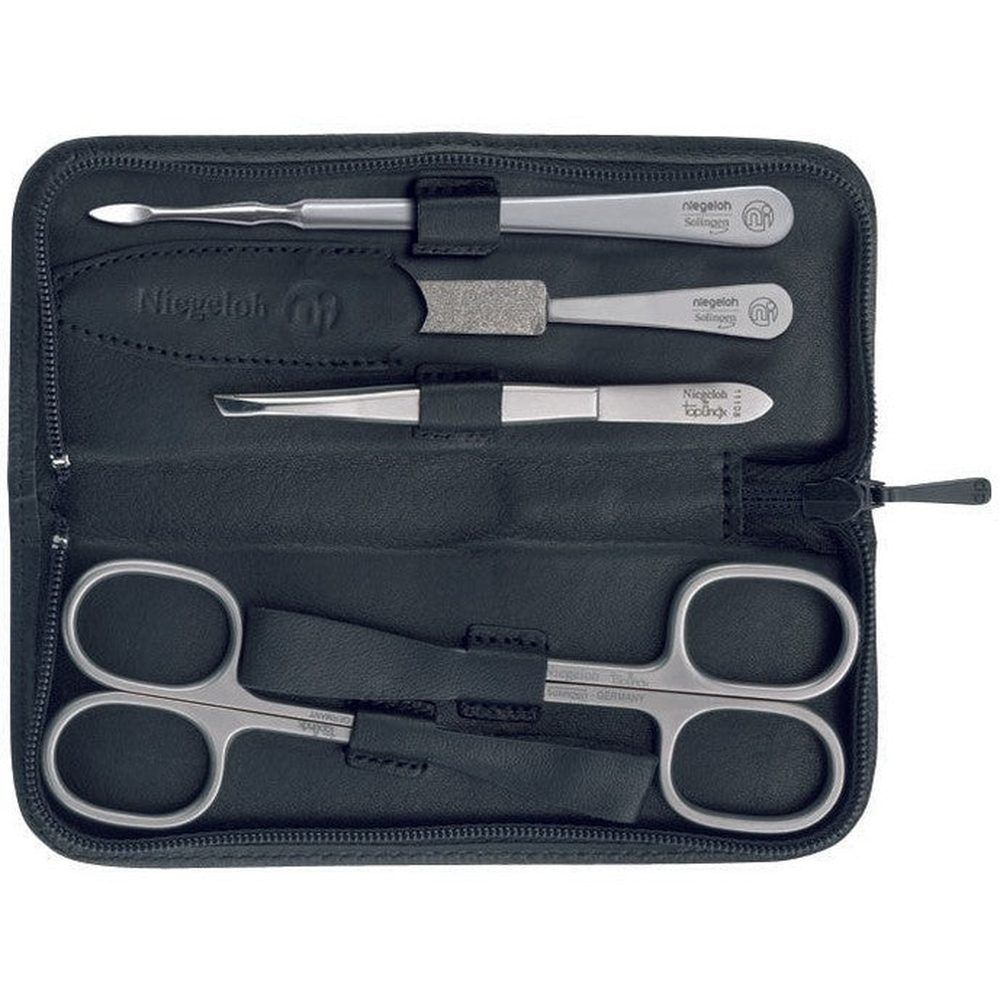 Schwarzes Etui mit Reißverschluss. Enthält Nagelschere, Pinzette, Nagelfeile und weitere Instrumente. Marke Niegeloh.