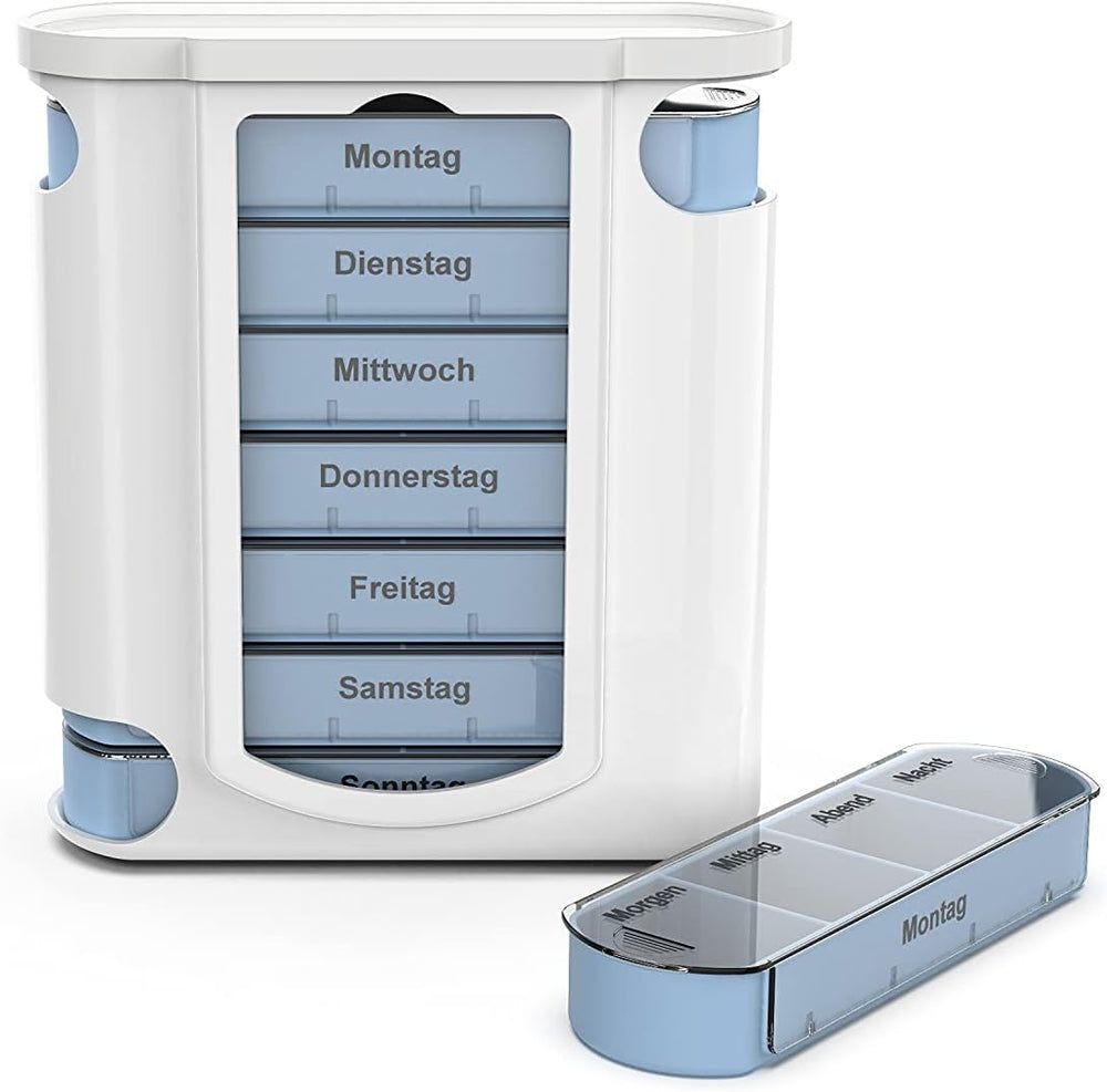 Weiße Tablettenbox mit blauen Schubladen für die Wochentage. Eine separate Schublade liegt daneben.