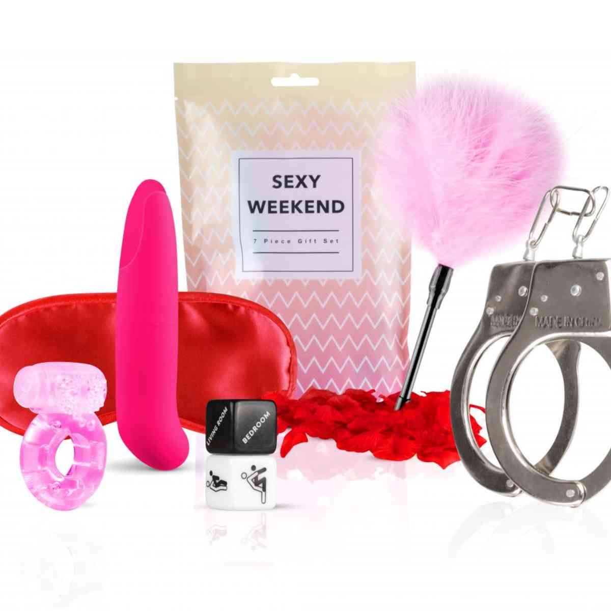 Geschenkset mit Vibrator, Augenmaske, Ring, Handschellen, Federboa, Massageöl und Verpackung "SEXY WEEKEND".