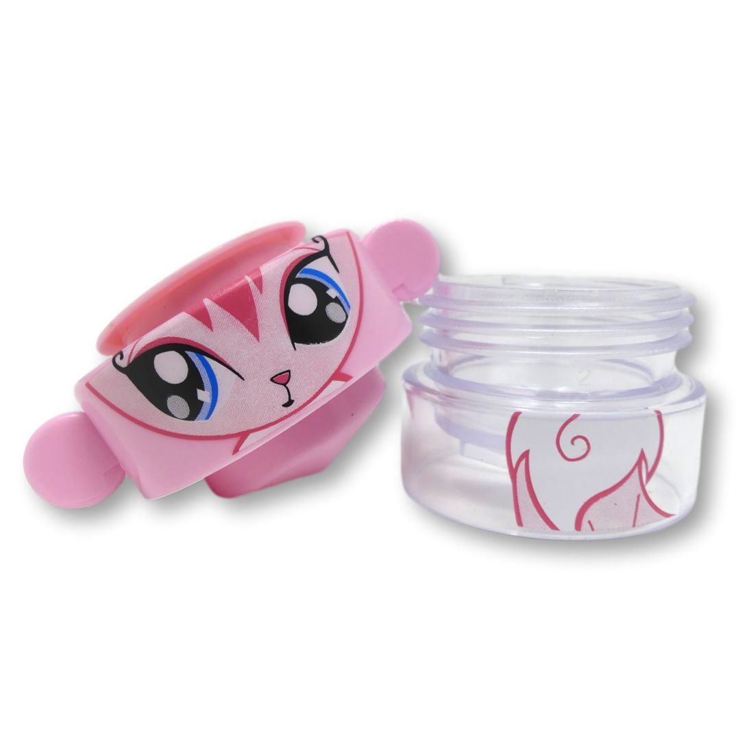 Pinkfarbener Tablettenmörser mit Tierdesign, geöffnet. Transparenter Behälter.