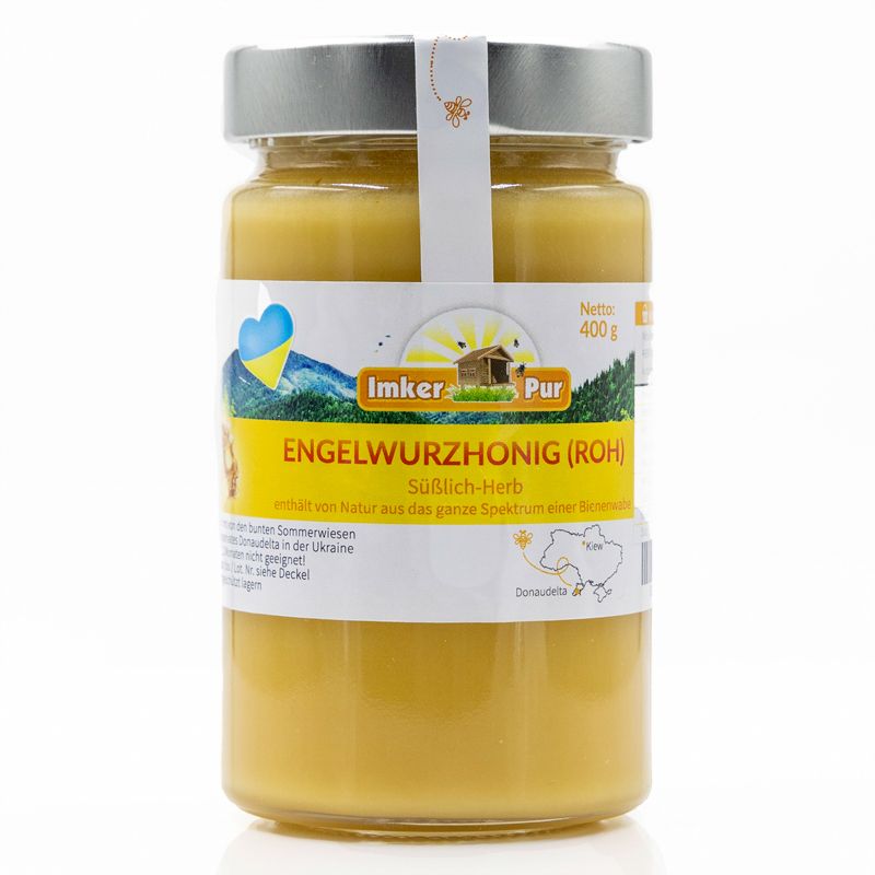 Glas mit ImkerPur Engelwurzhonig (roh). Etikett mit Produktbezeichnung und Logo. Honig gelblich.